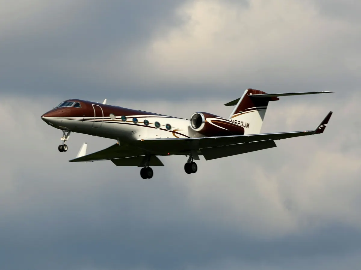 Light business jet on final approach