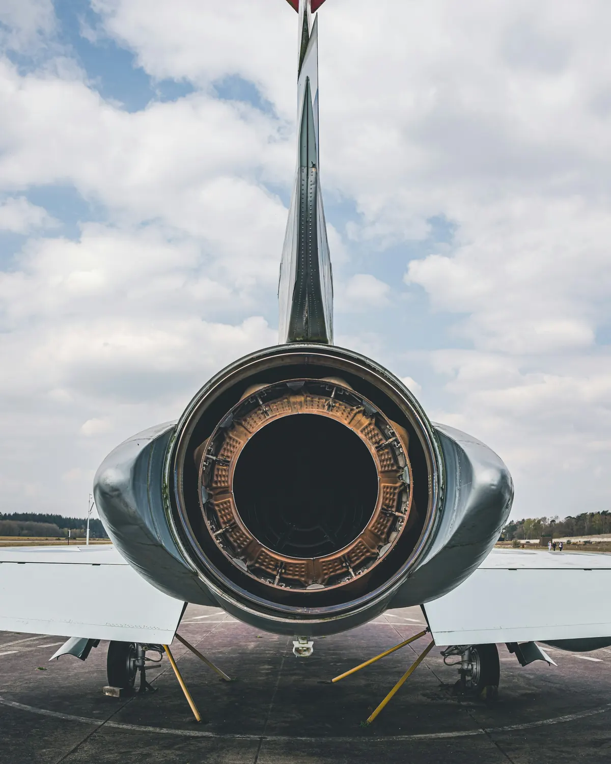 Close view of a business jet's tail engine on the ramp