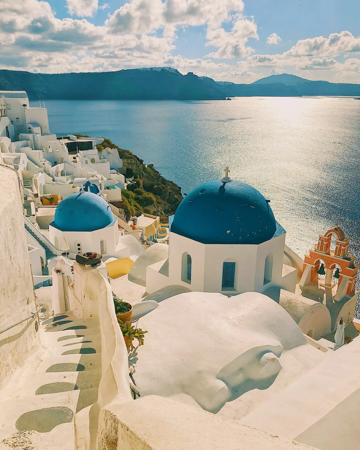 White houses and blue domes above the sea in Santorini